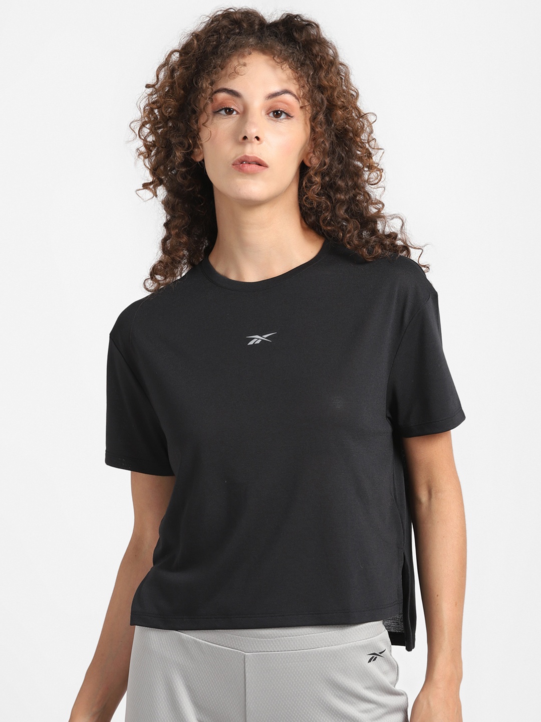 

Reebok Women Black Graphic Printed Back Run Essentials Running T-Shirt