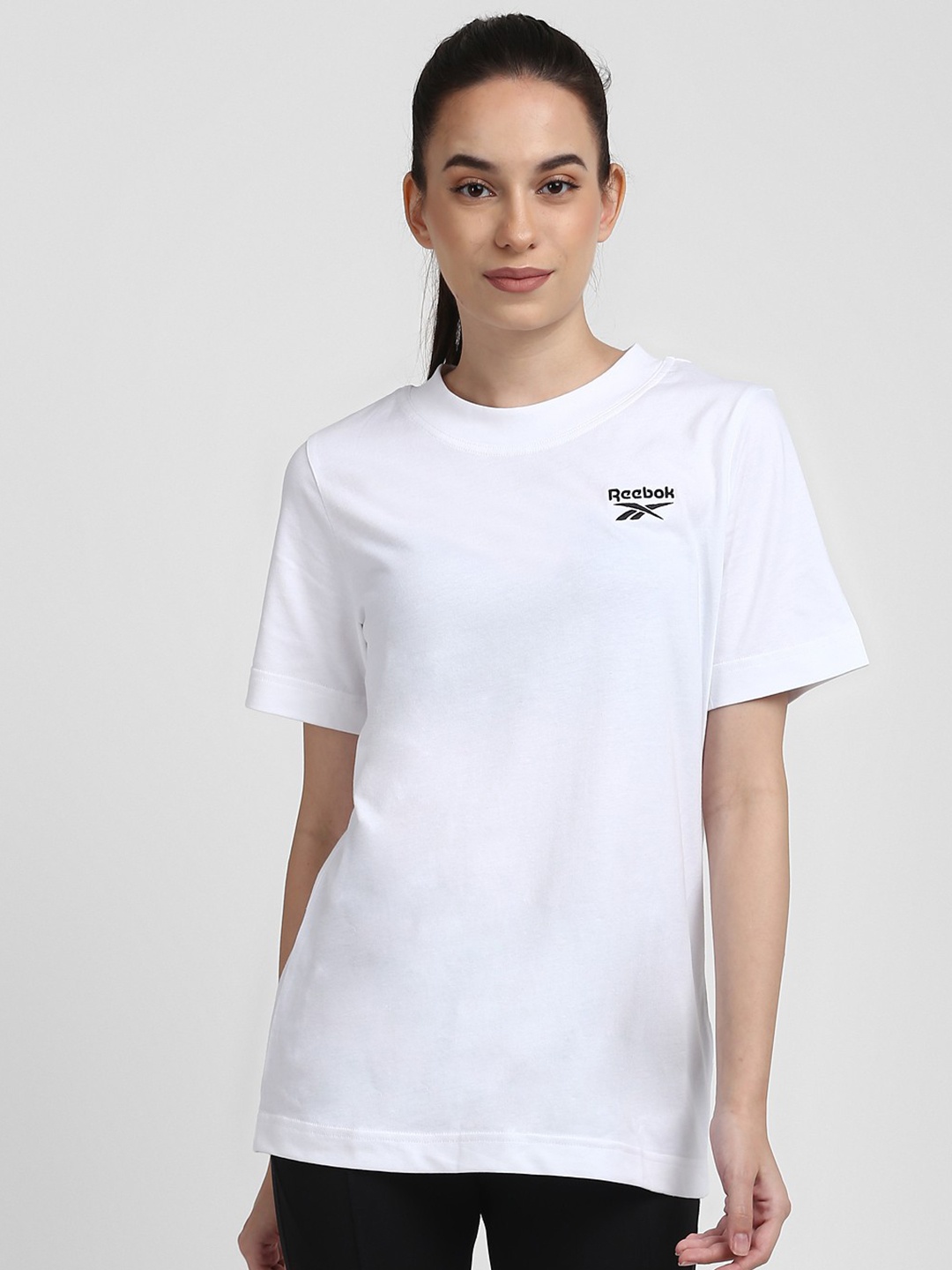 

Reebok Women White Brand Logo Printed Pure Cotton Training or Gym Pure Cotton T-shirt