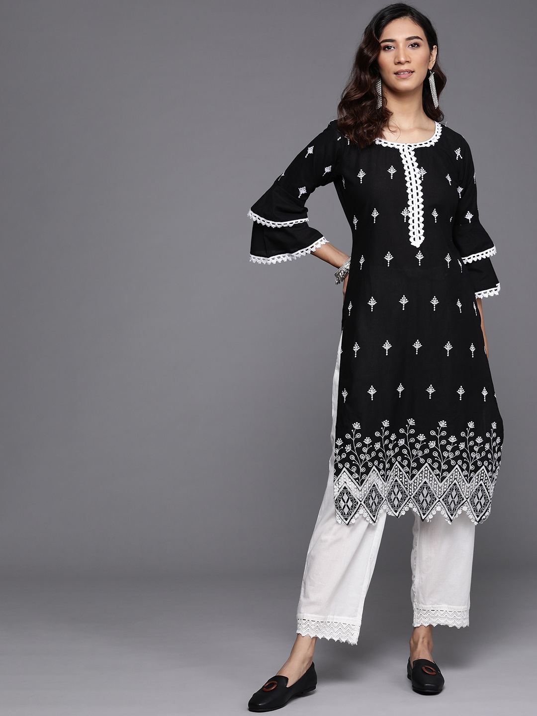 

Libas Women Black & White Ethnic Motifs Embroidered Bell Sleeves Straight Kurta