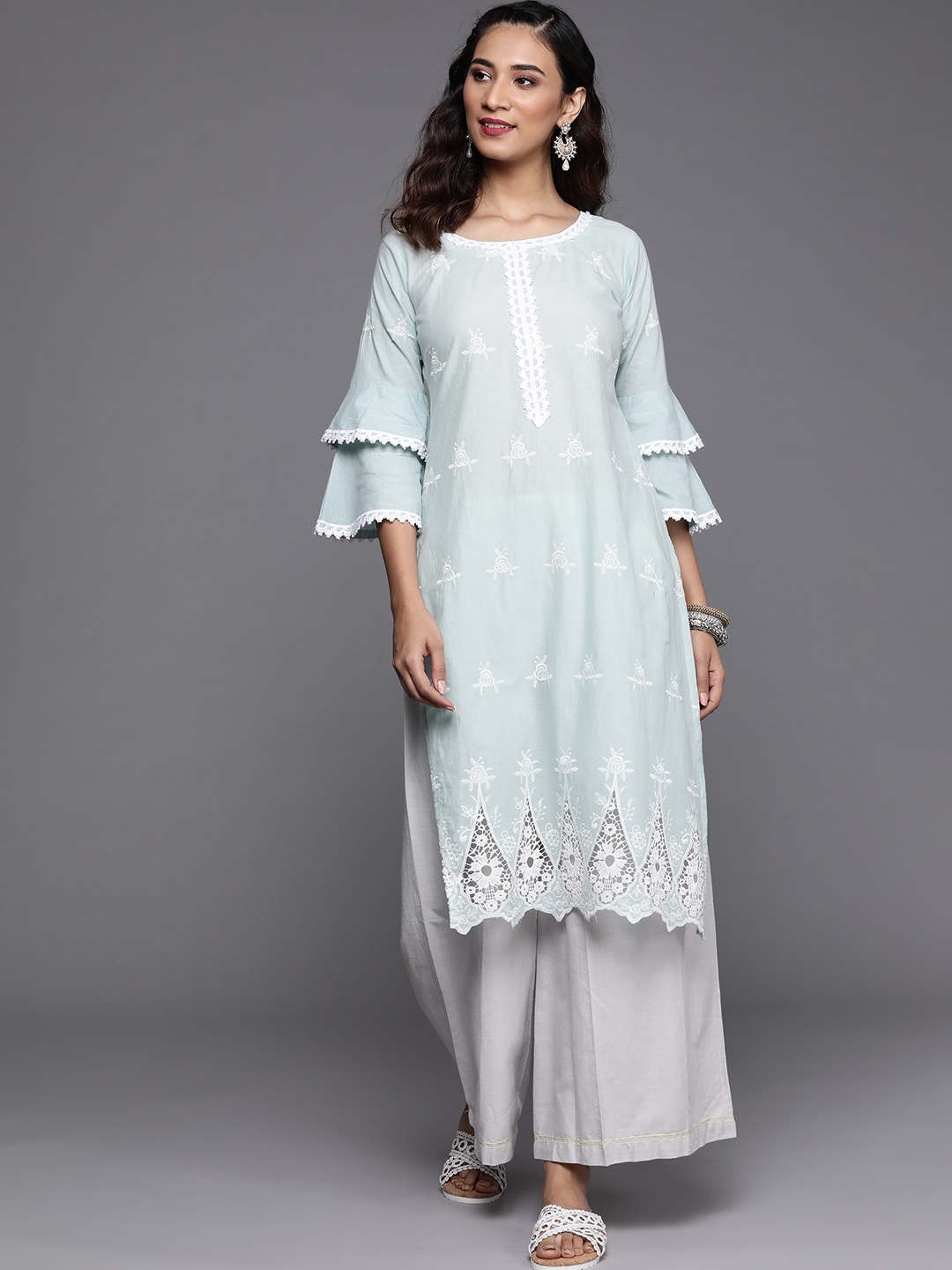 

Libas Women Blue & White Ethnic Motifs Embroidered Bell Sleeves Straight Kurta