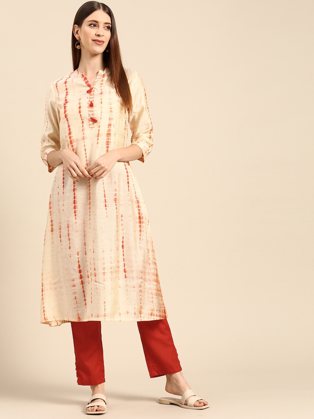 

Anouk Women Off-White & Rust Red Dyed Kurta with Trousers