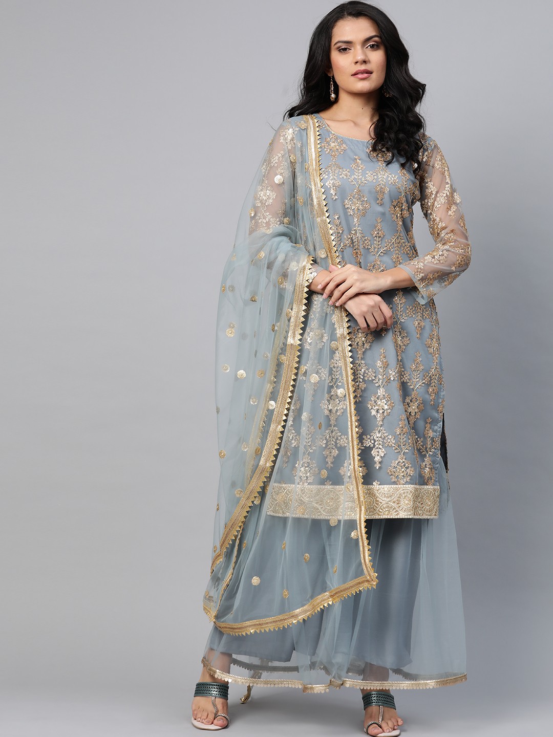 

Readiprint Fashions Women Grey & Golden Embroidered Semi-Stitched Dress Material
