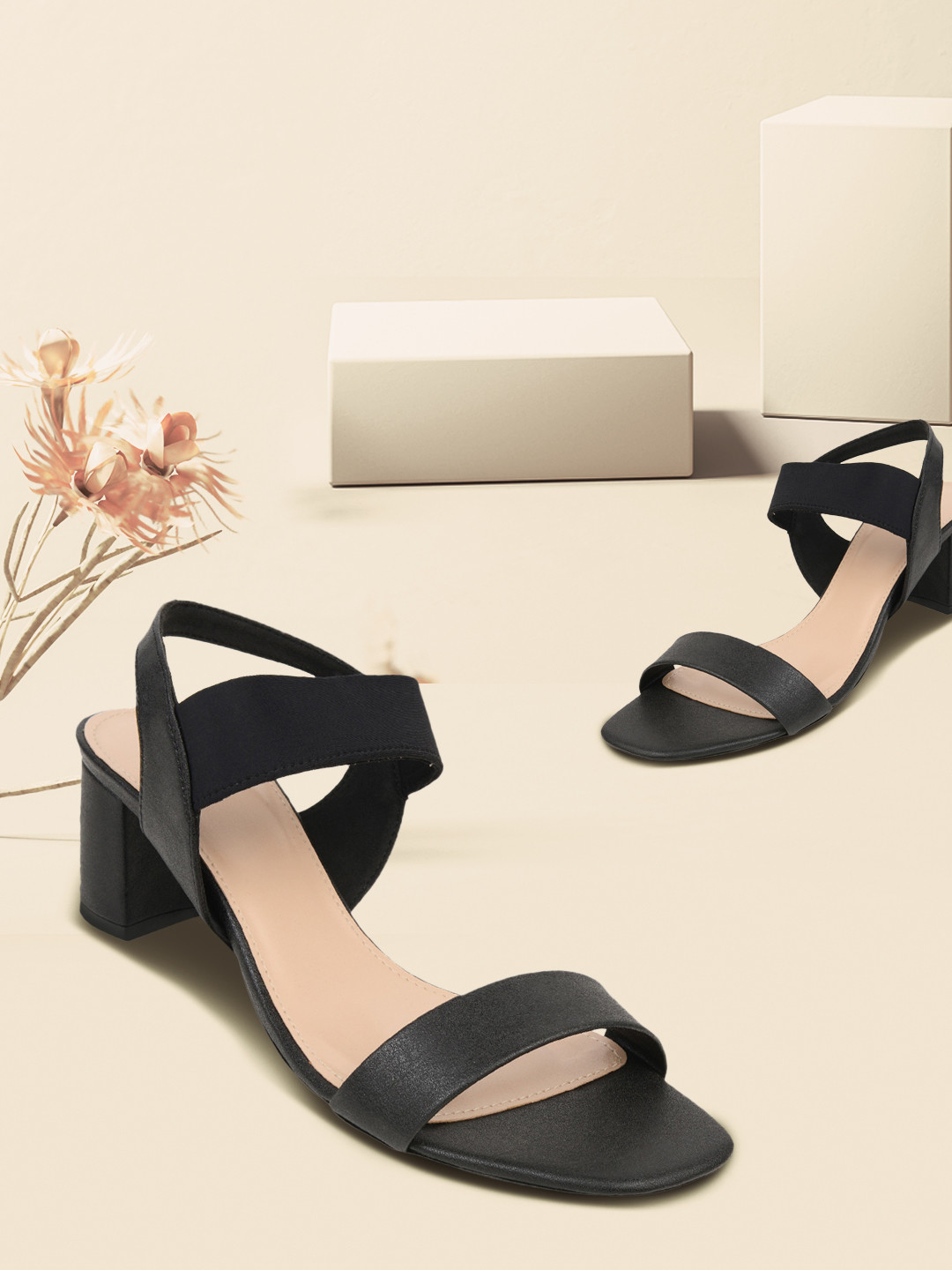 

Rocia Women Black Solid Block Heels