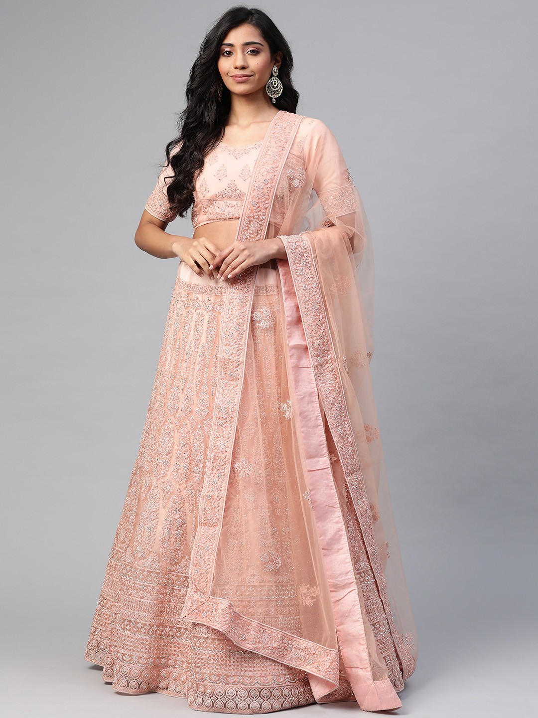 

SHUBHVASTRA Peach-Coloured & Silver-Toned Embroidered Beads and Stones Semi-Stitched Lehenga & Unstitched