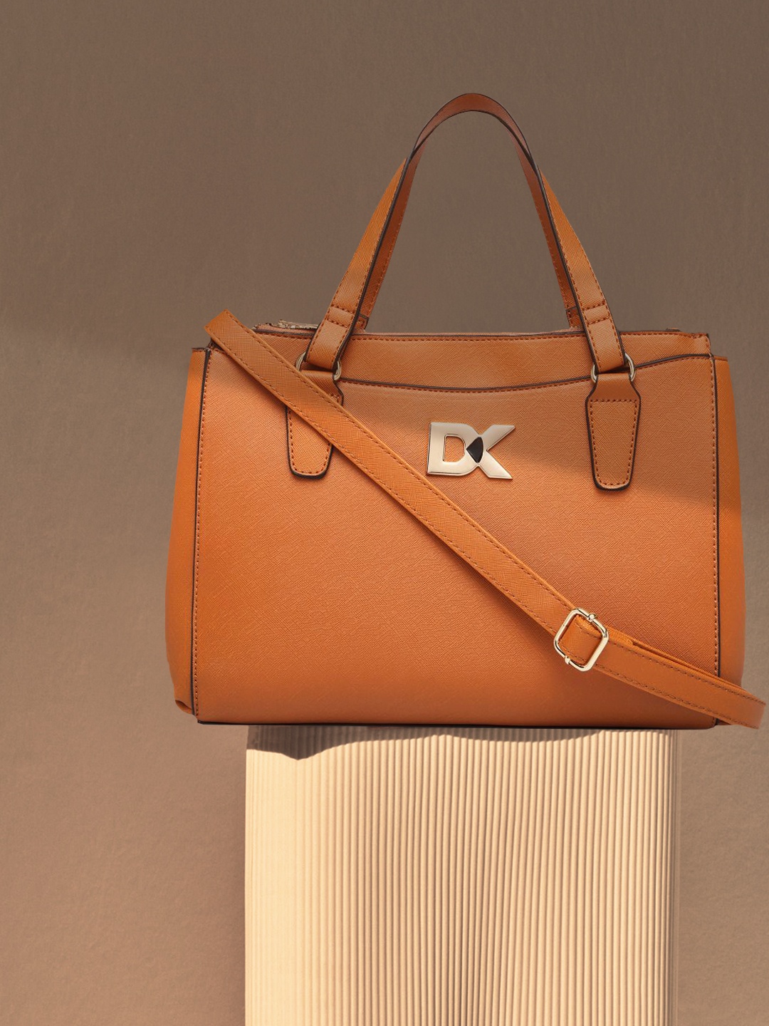 

Diana Korr Women Brown Textured Sling Bag