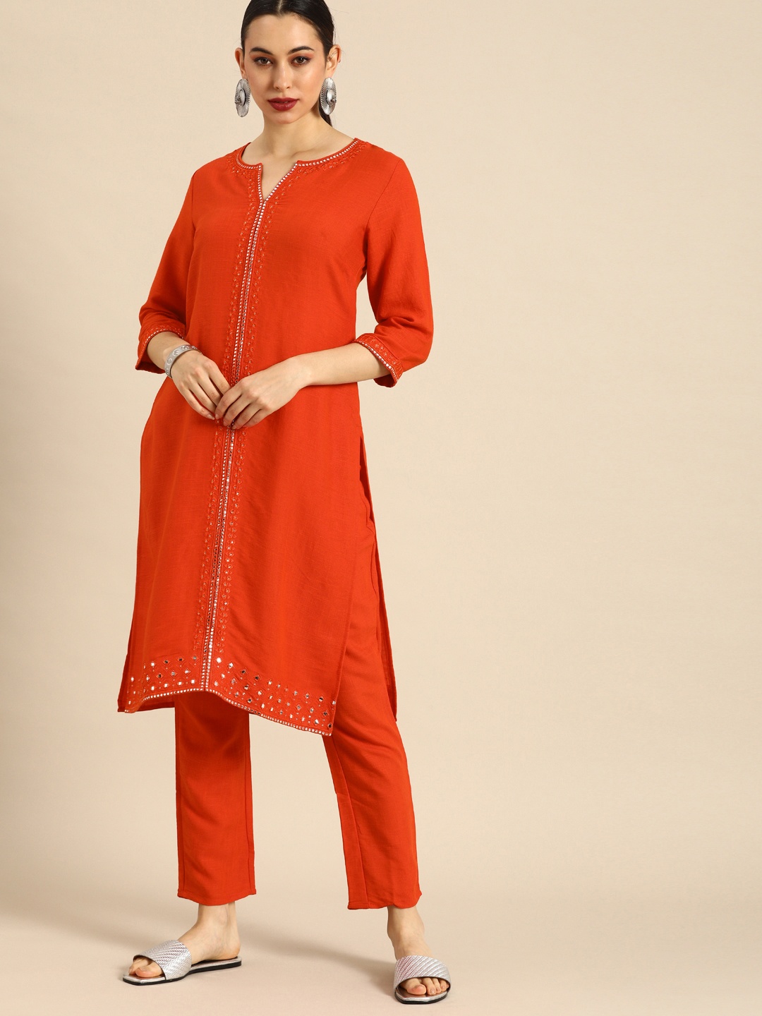 

Anouk Women Orange Floral Embroidered Regular Mirror Work Kurta with Trousers