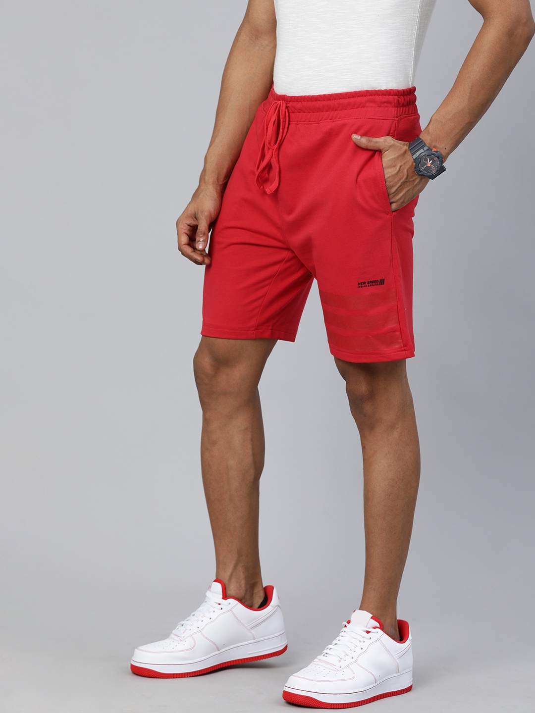 

The Indian Garage Co Men Red Solid Mid-Rise Regular Shorts