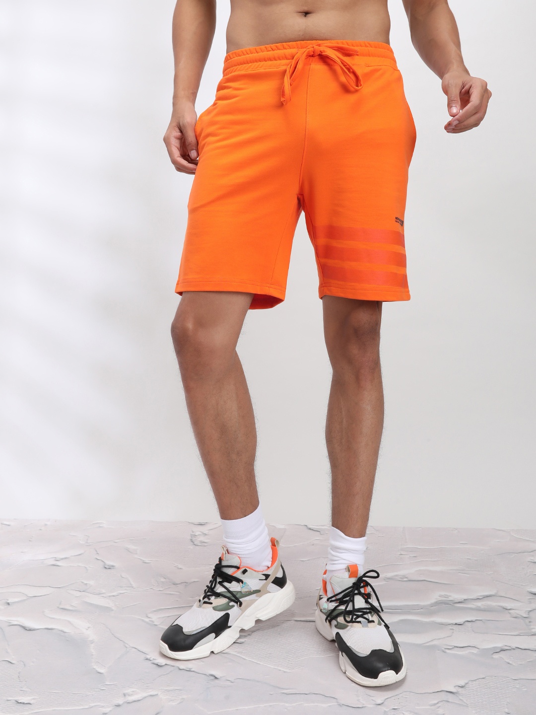 

The Indian Garage Co Men Orange Solid Mid-Rise Regular Shorts