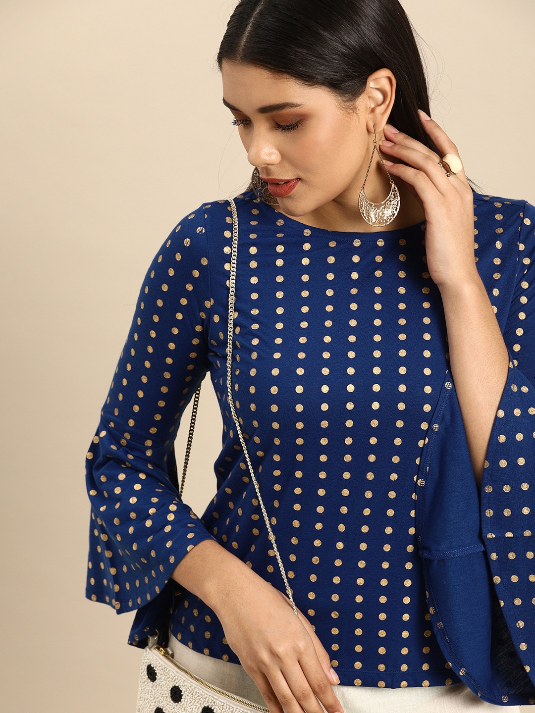 

Anouk Blue & Gold-Toned Polka Dot Printed Bell Sleeves Knitted Regular Top