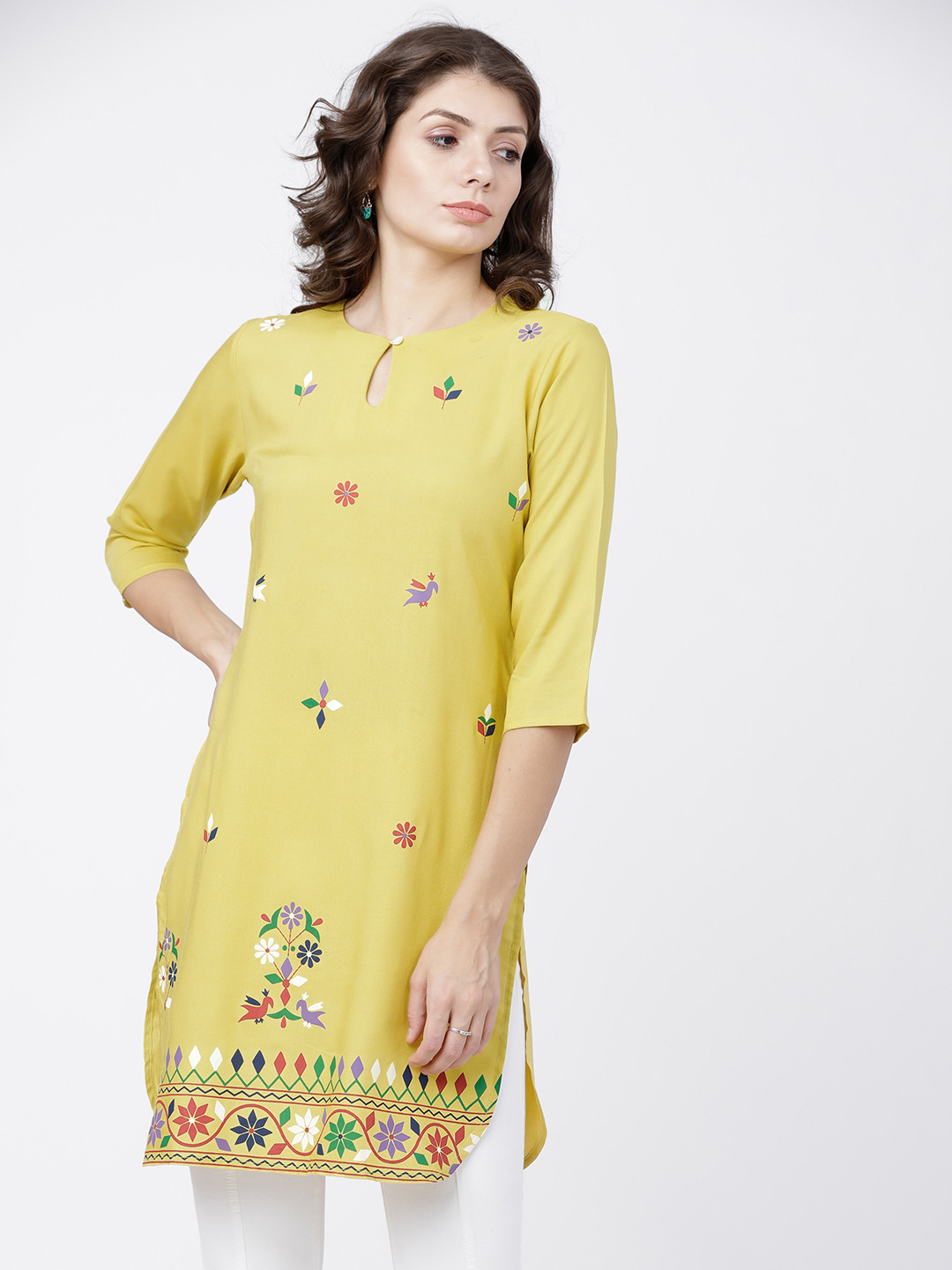

Vishudh Women Yellow & Purple Printed Tunic