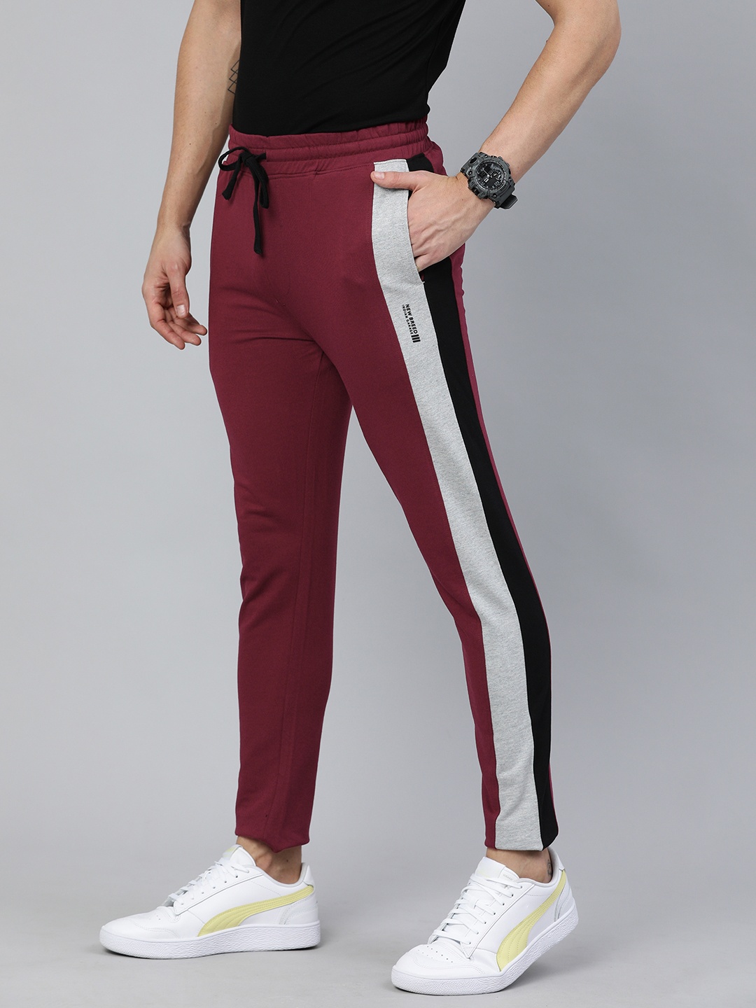 

The Indian Garage Co Men Maroon Solid Slim-Fit Track Pant With Side Stripes