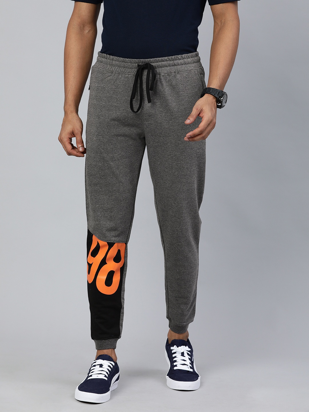 

The Indian Garage Co Men Charcoal Grey Solid Regular Fit Joggers with Print Detail