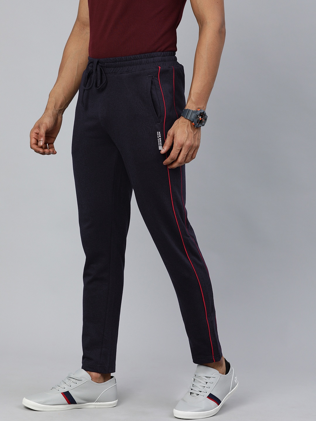 

The Indian Garage Co Men Navy Blue Solid Slim-Fit Track Pants With Side Stripes