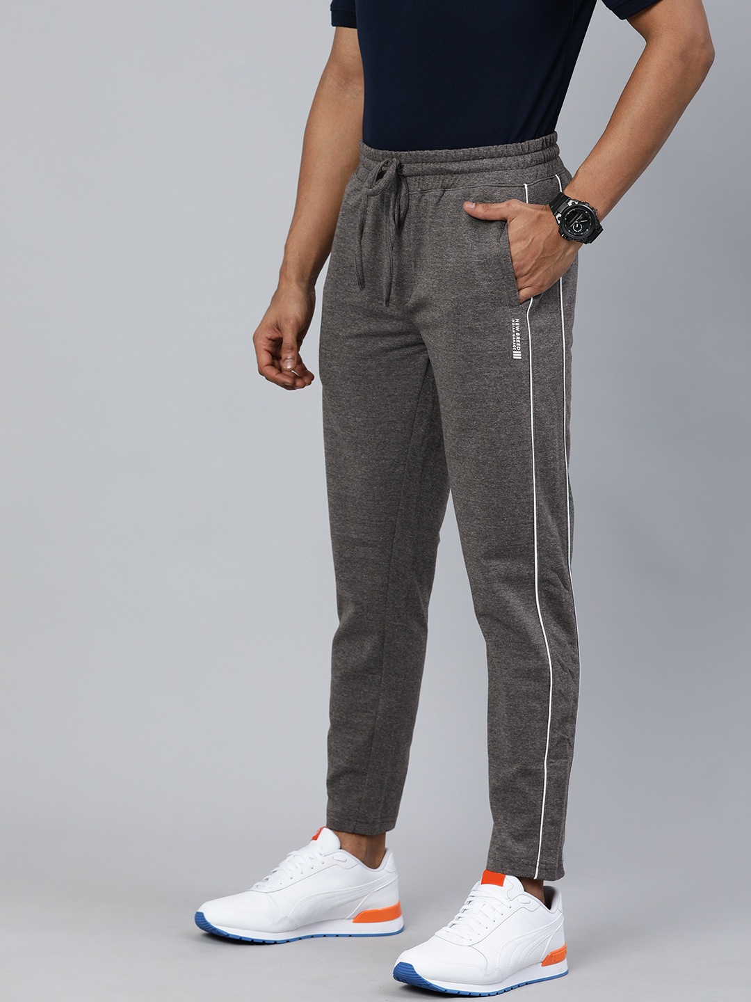 

The Indian Garage Co Men Charcoal Grey Solid Regular Fit Track Pants with Side Stripes