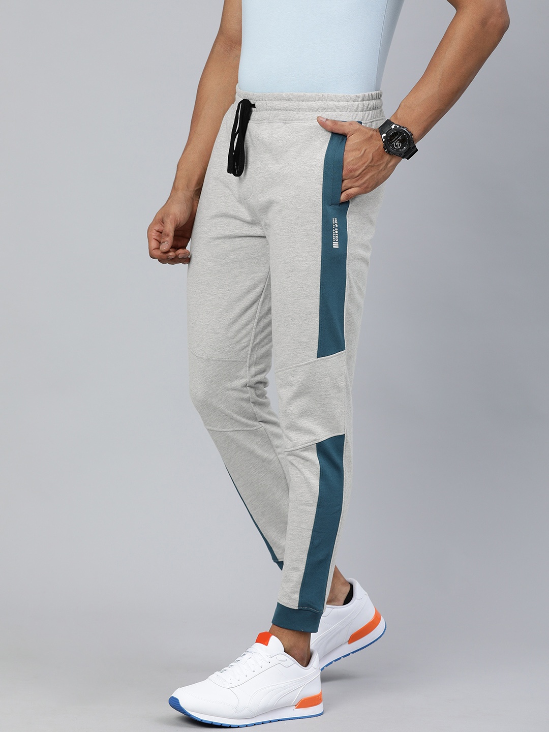

The Indian Garage Co Men Grey Solid Regular Fit Joggers with Side Stripes