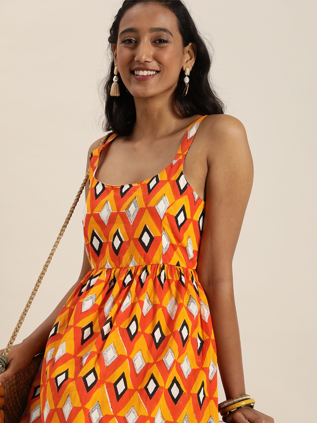 

Taavi Women Orange & Yellow Wild Tribe Printed Smocked A-Line Maxi Dress