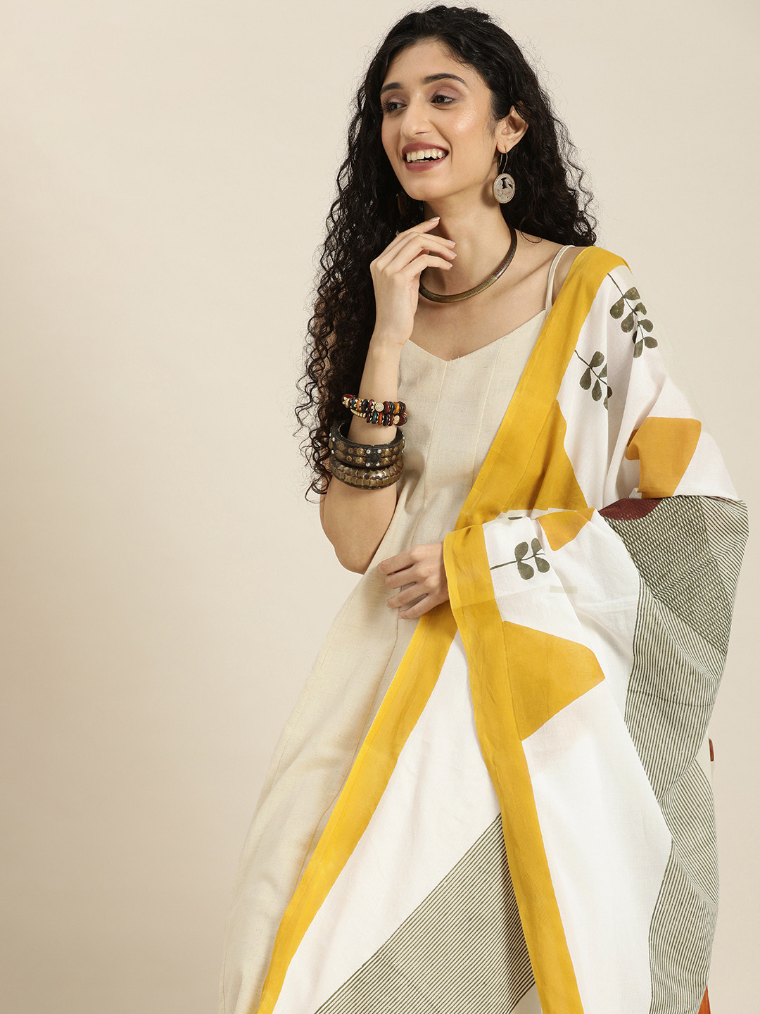 

Taavi Women Off White Kurta with Trousers & Wild Tribe Hand block Printed With Dupatta