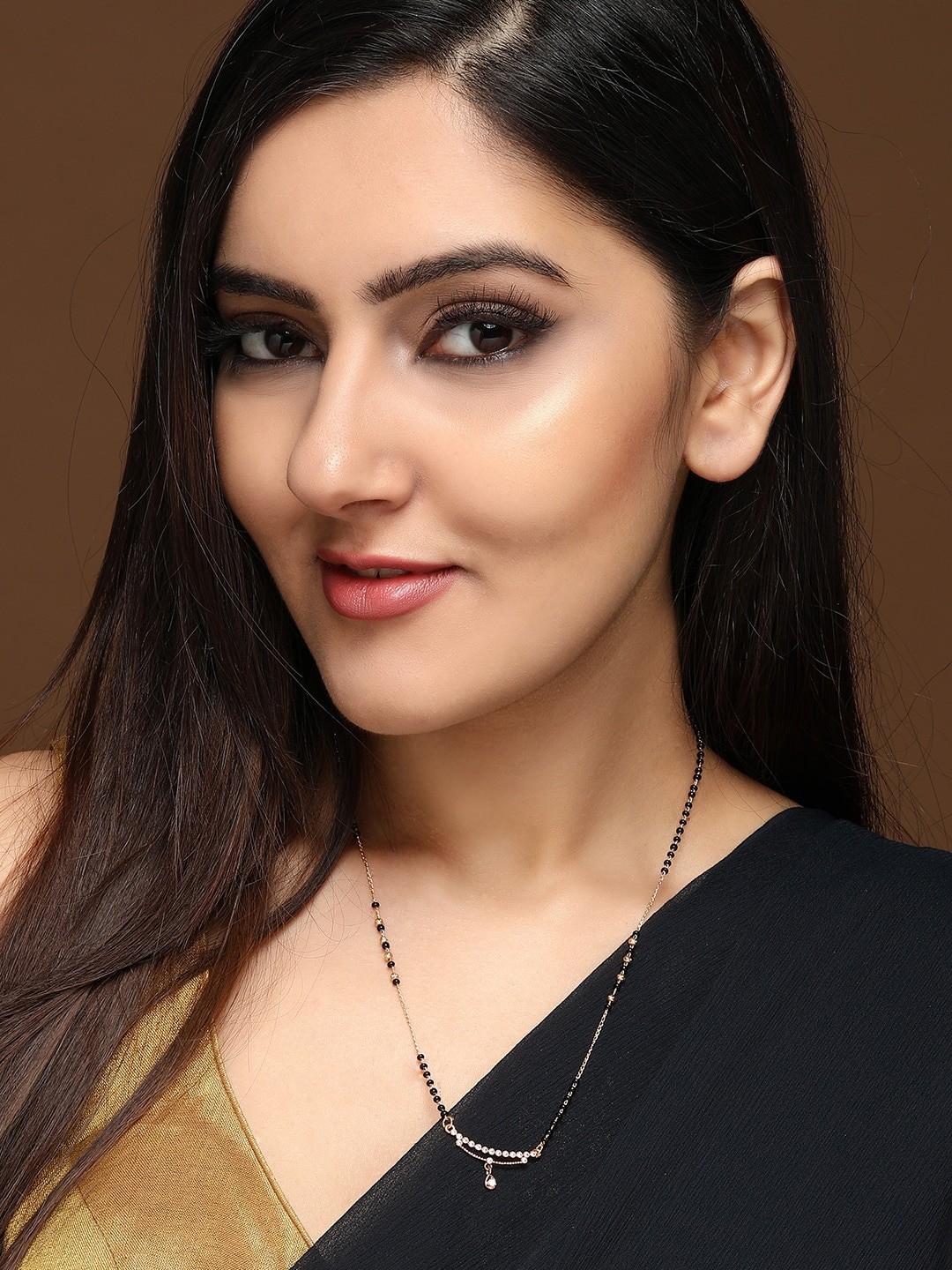 

Rubans Gold-Plated Black Beaded & White Zircon-Studded Handcrafted Mangalsutra