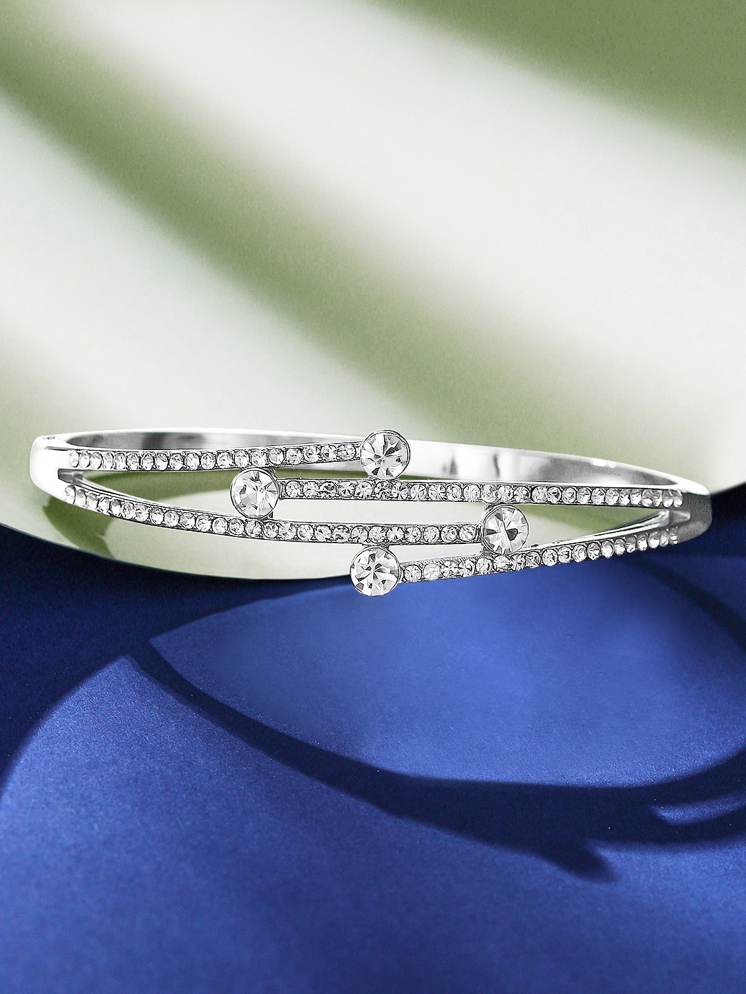 

Rubans Silver-Toned Handcrafted Bangle-Style Bracelet