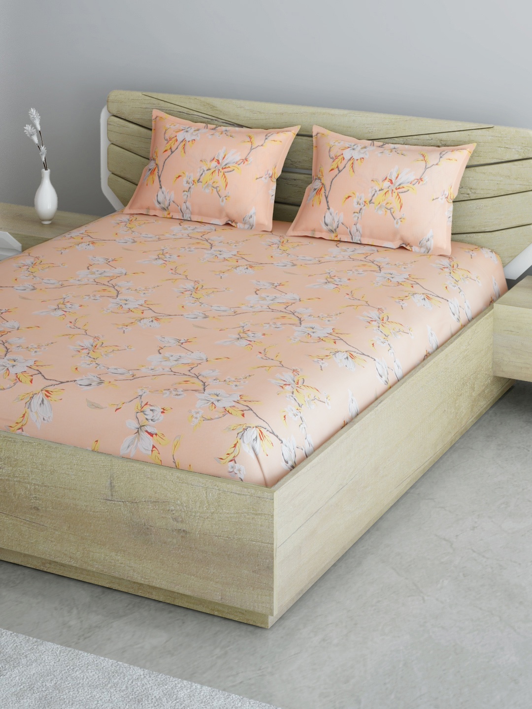 

Aura Peach-Coloured & White Floral 144 TC Queen Bedsheet with 2 Pillow Covers