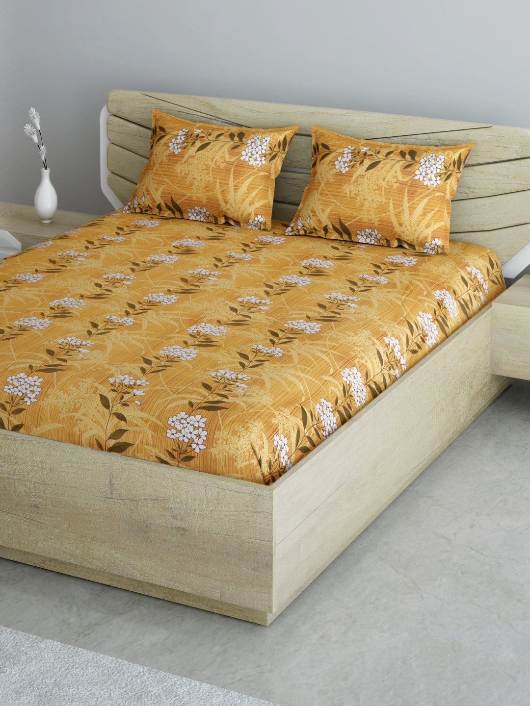 

Aura Mustard & White Floral 144 TC 120 GSM Queen Bedsheet with 2 Pillow Covers