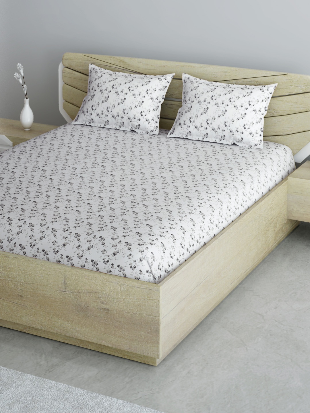 

Aura White & Grey Floral 144 TC 120 GSM Cotton Queen Bedsheet with 2 Pillow Covers