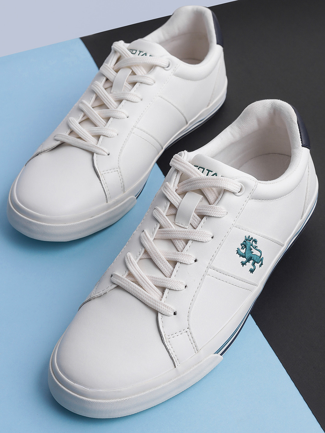 

Red Tape Men Off-White Solid Sneakers