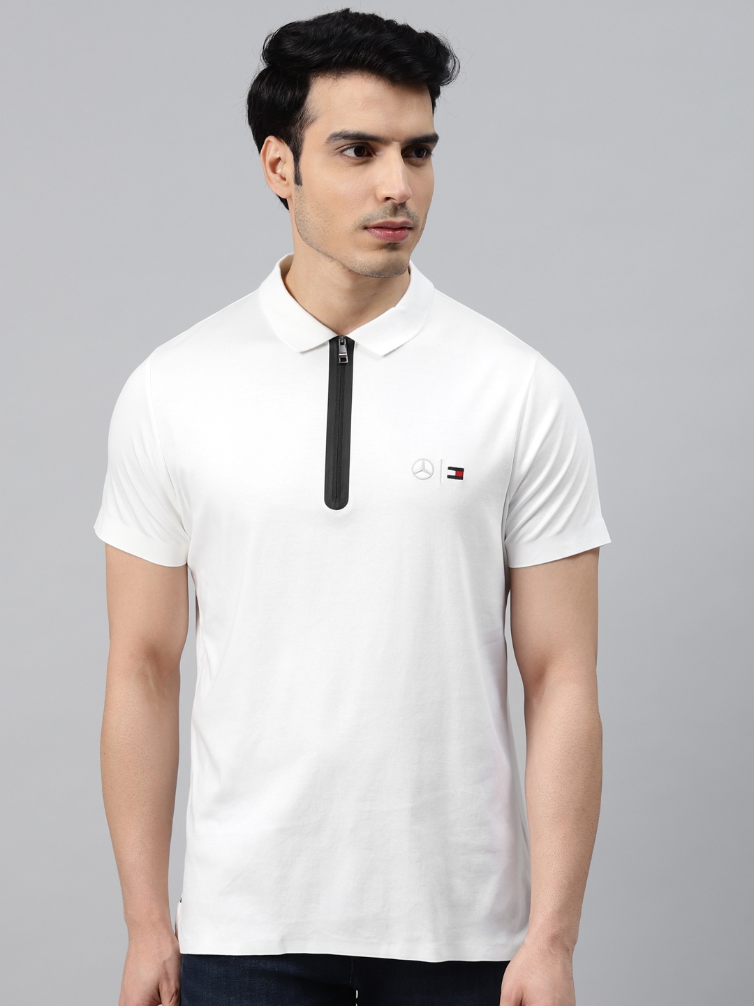 

Tommy Hilfiger Men White Solid Polo Collar Slim Fit T-shirt