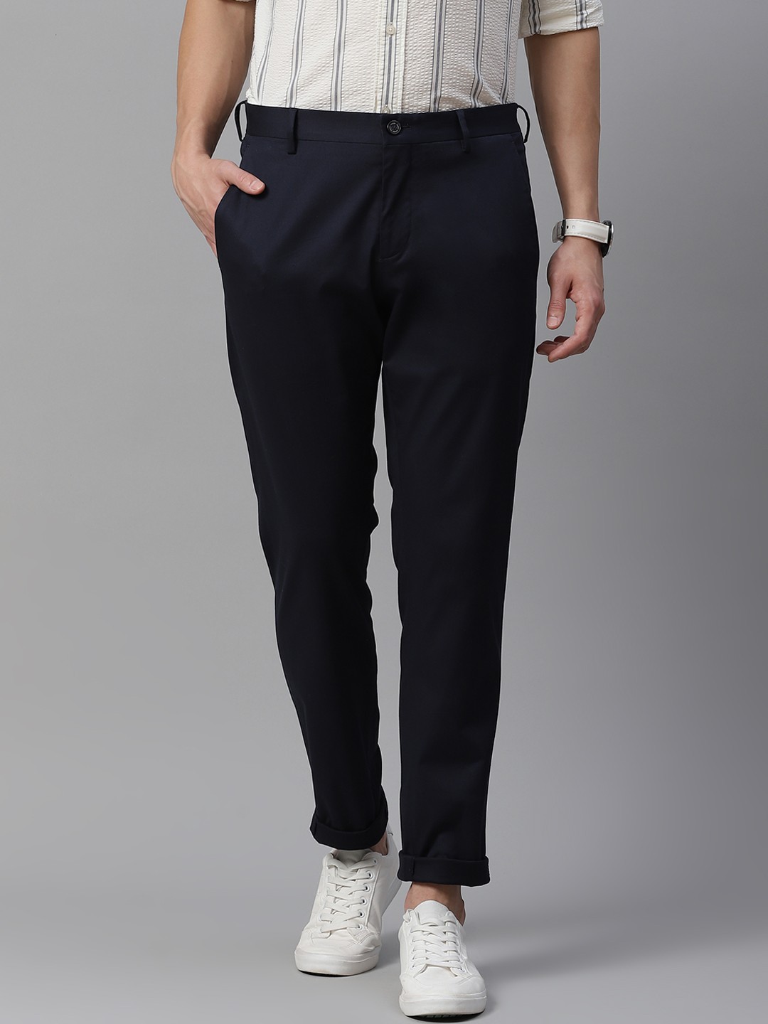 

Tommy Hilfiger Men Navy Blue Solid Regular Trousers