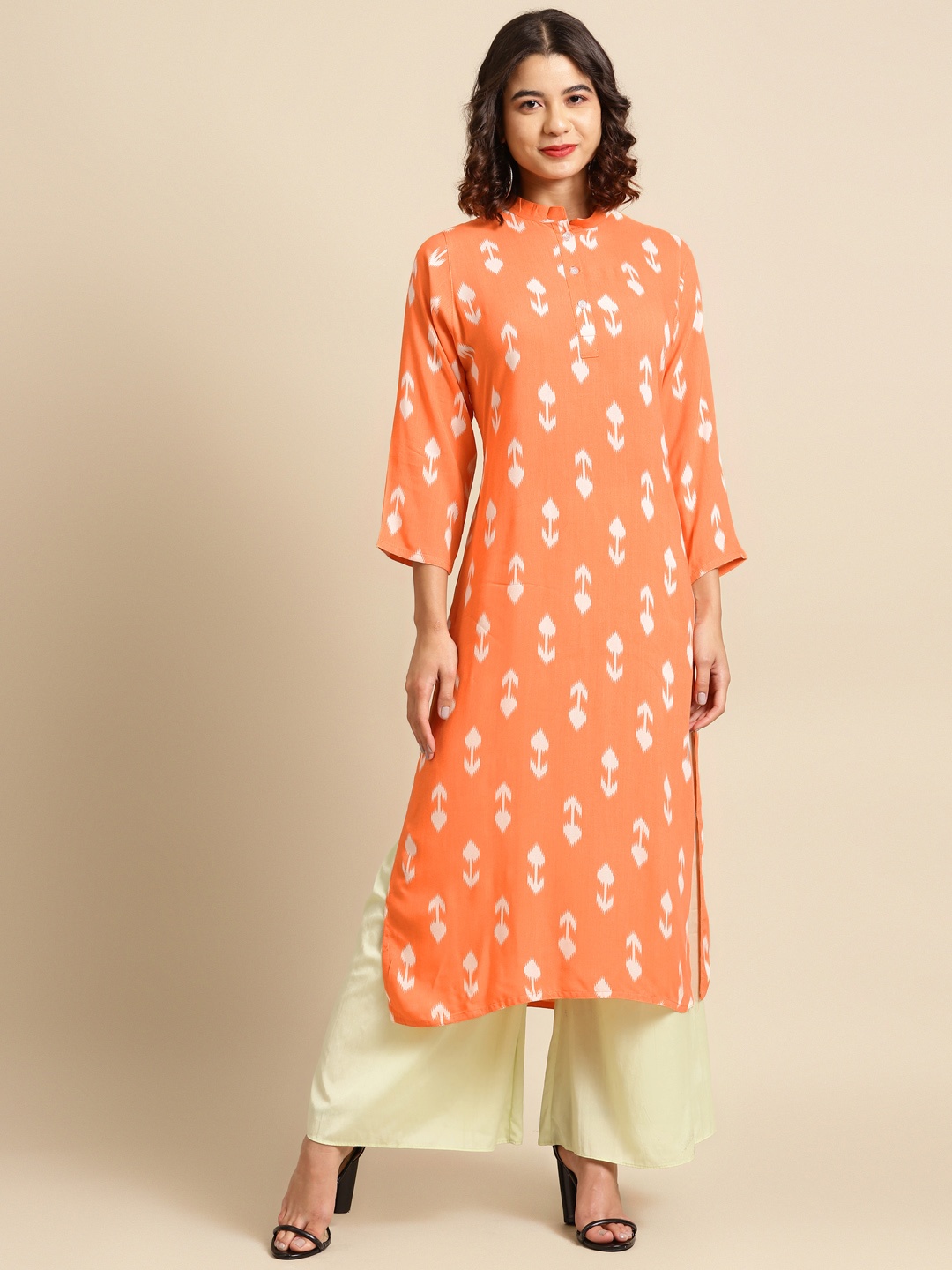 

Saadgi Women Orange & White Ikkat Printed Straight Kurta