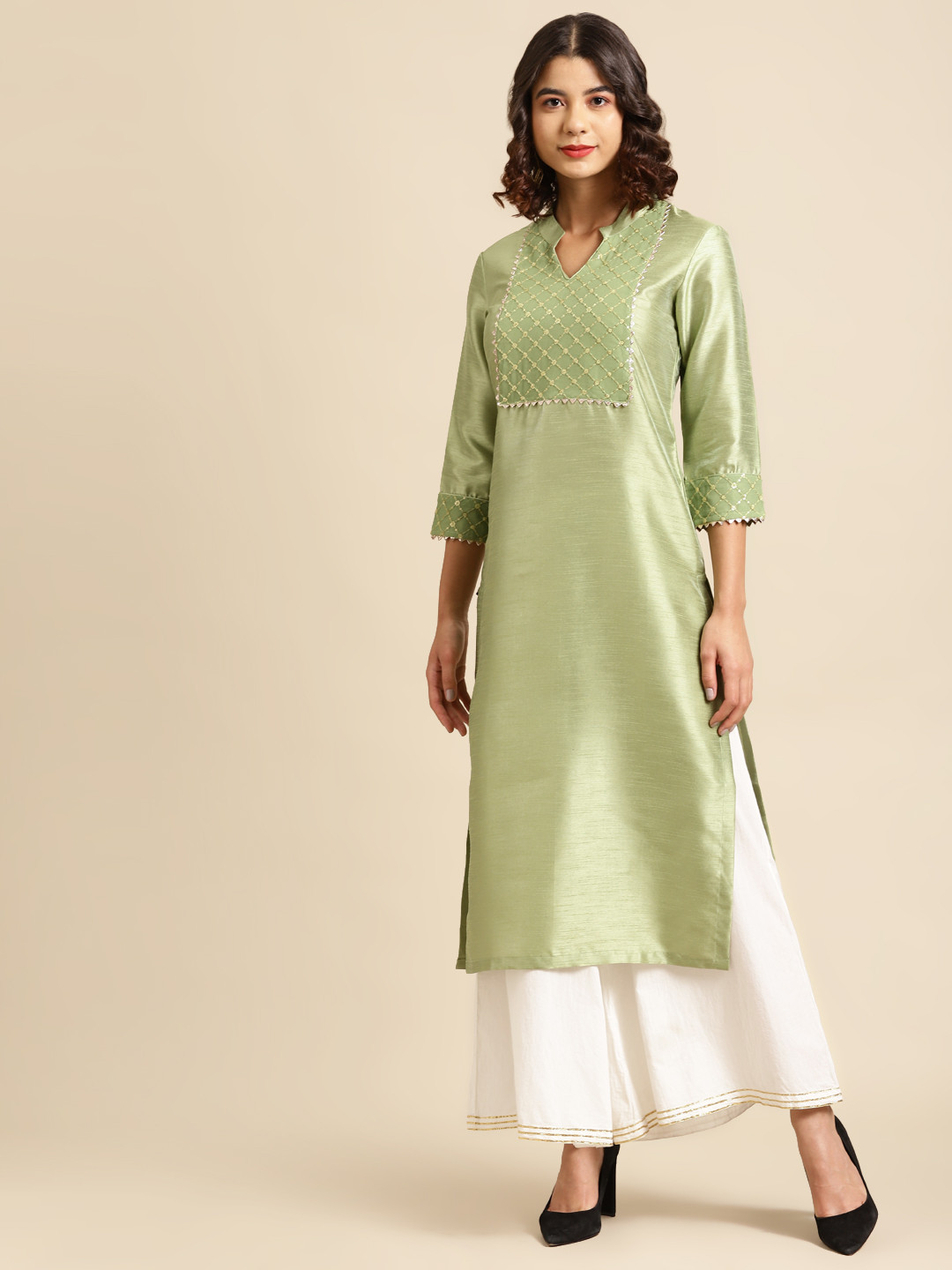 

Saadgi Women Green Embellished Yoke Design Kurta
