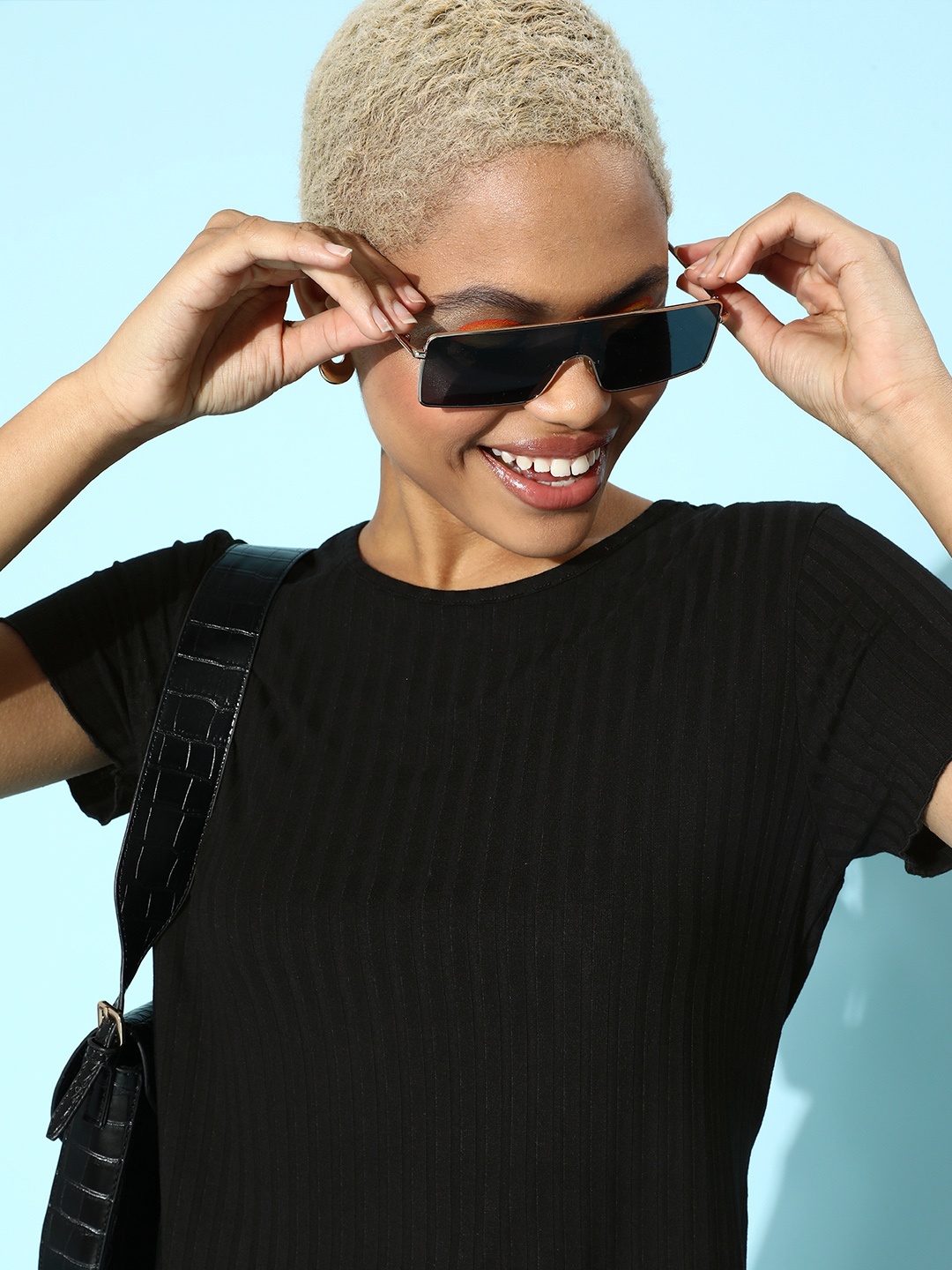 

Globus Women Black Solid Knitted Tshirt