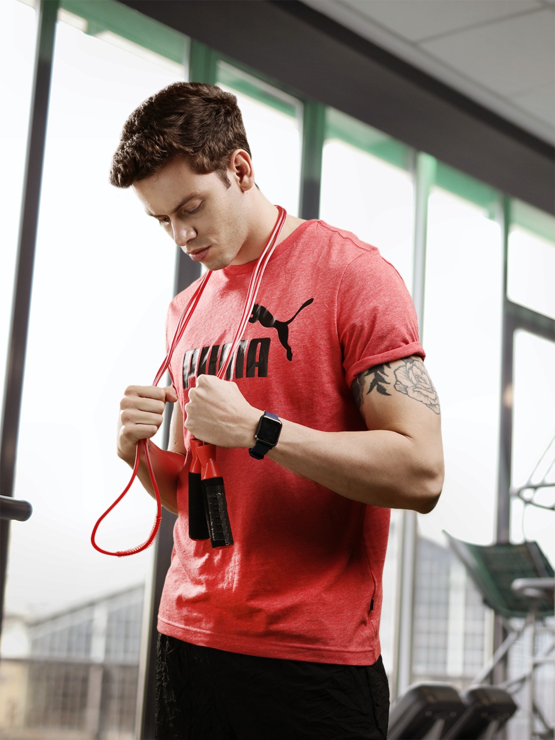 

Puma Men Coral Red & Black Printed Essentials Heather Sustainable T-shirt