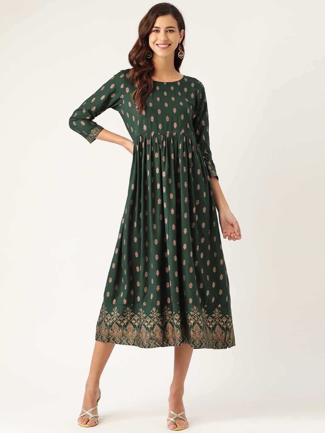 

Shae by SASSAFRAS Green & Golden Ethnic Motifs Printed A-Line Midi Dress