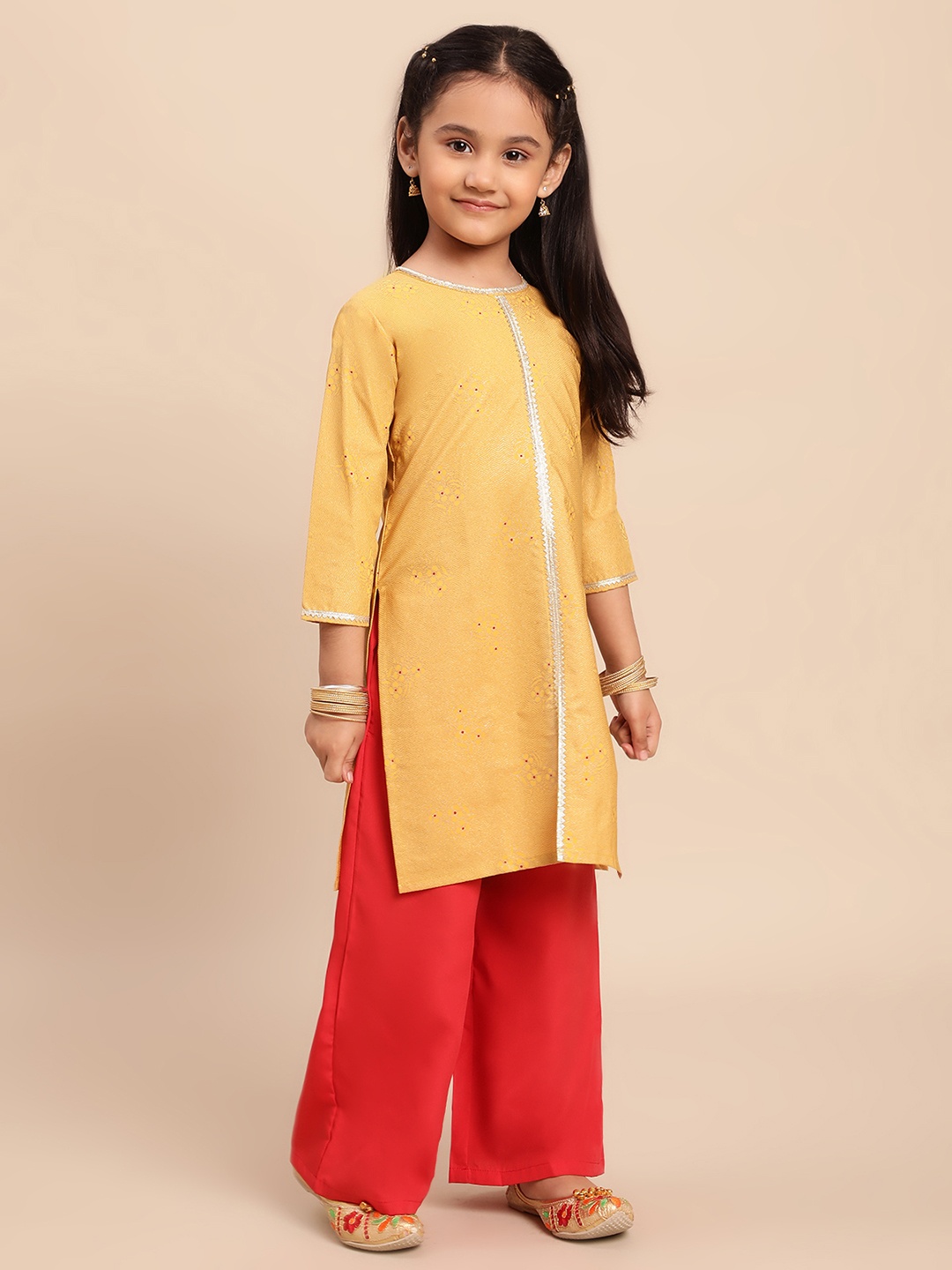 

Ahalyaa Girls Mustard Yellow & Red Printed Kurta with Palazzos
