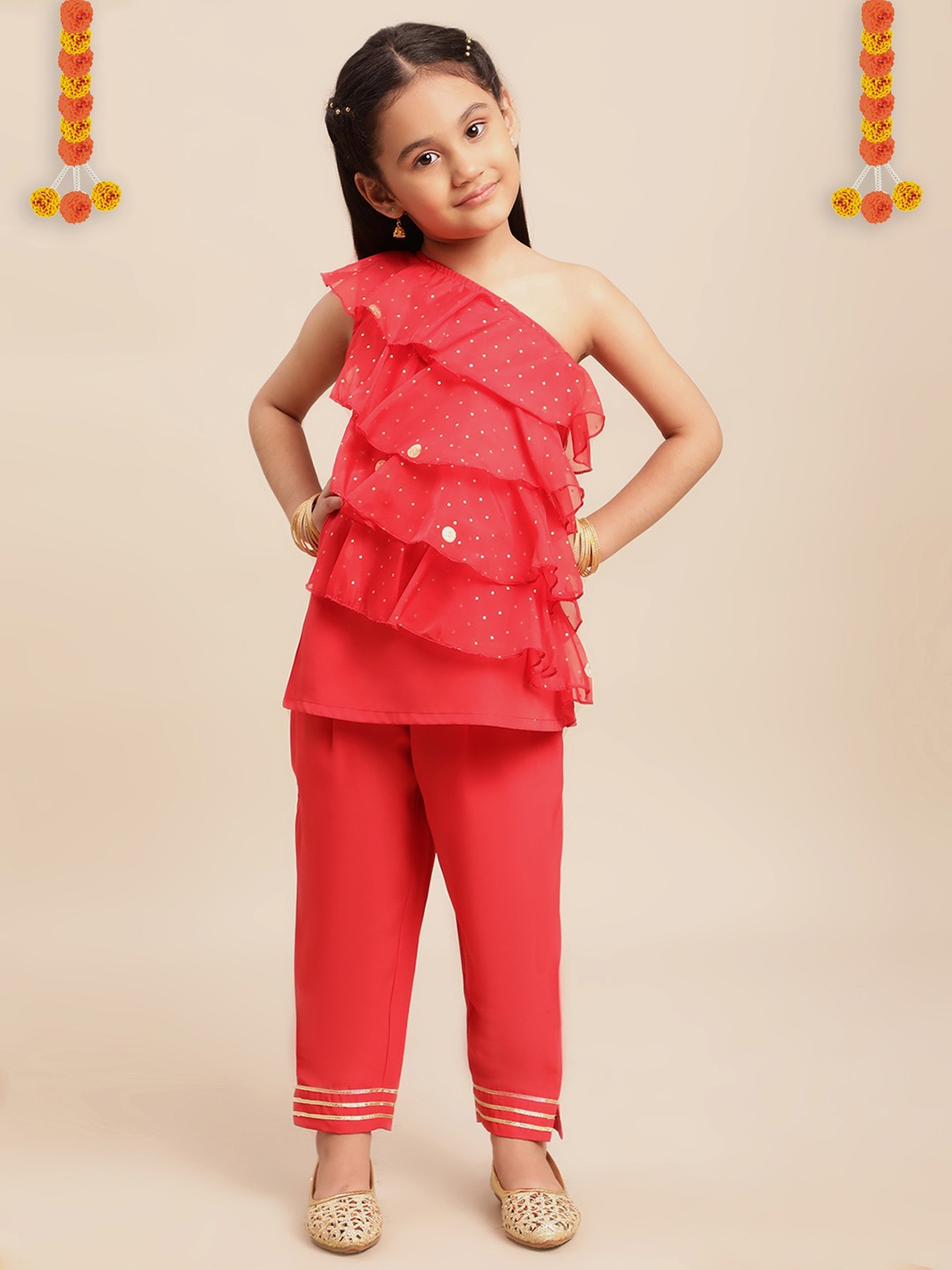 

Ahalyaa Girls Red Embellished Ruffled Kurta with Trousers