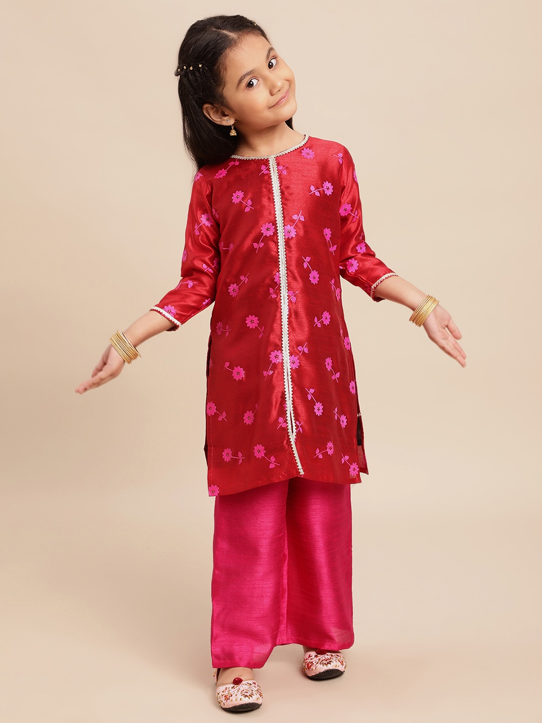 

Ahalyaa Girls Red Self Design Kurti with Palazzos