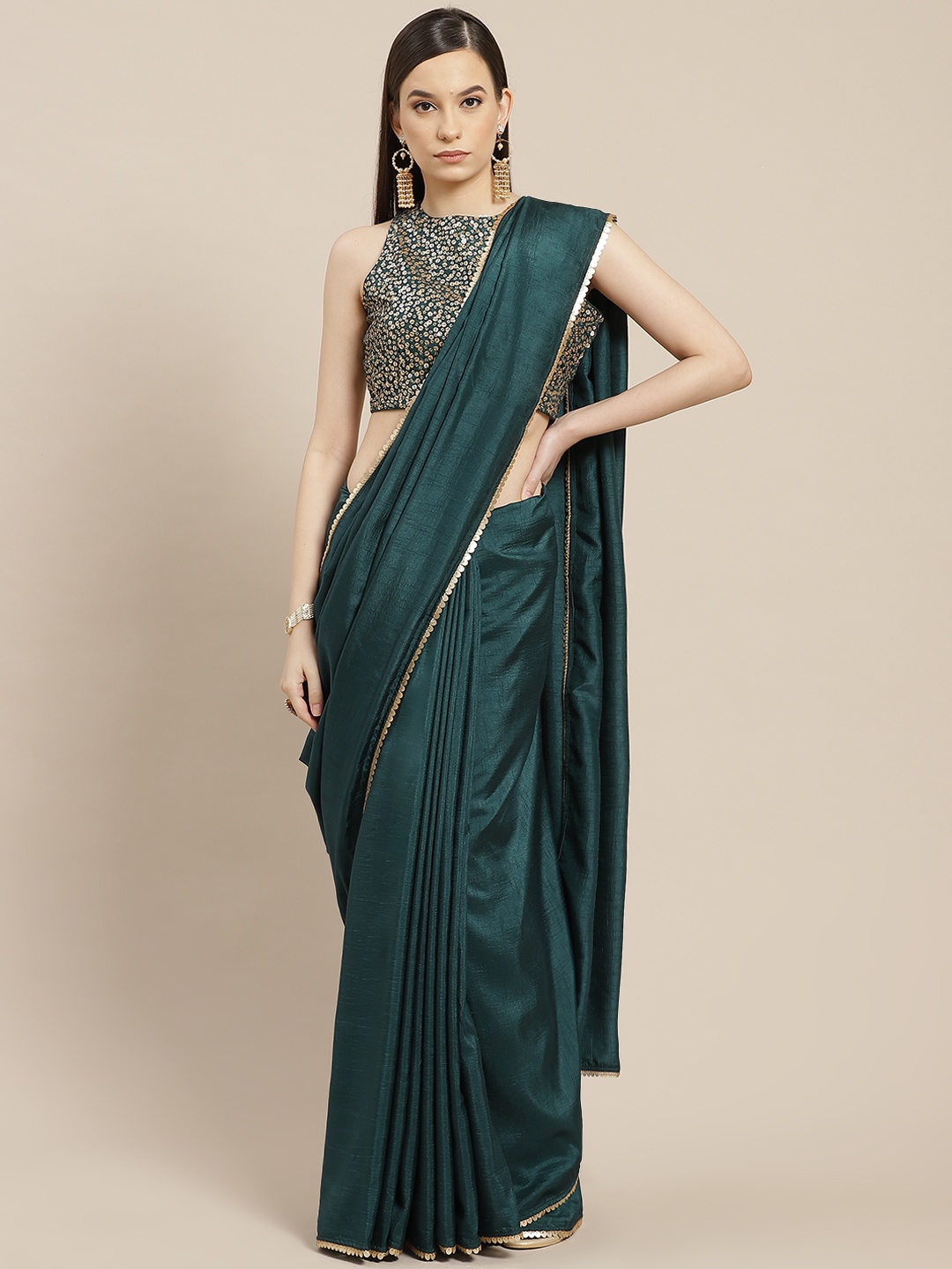 

Inddus Green Sequinned Silk Blend Saree