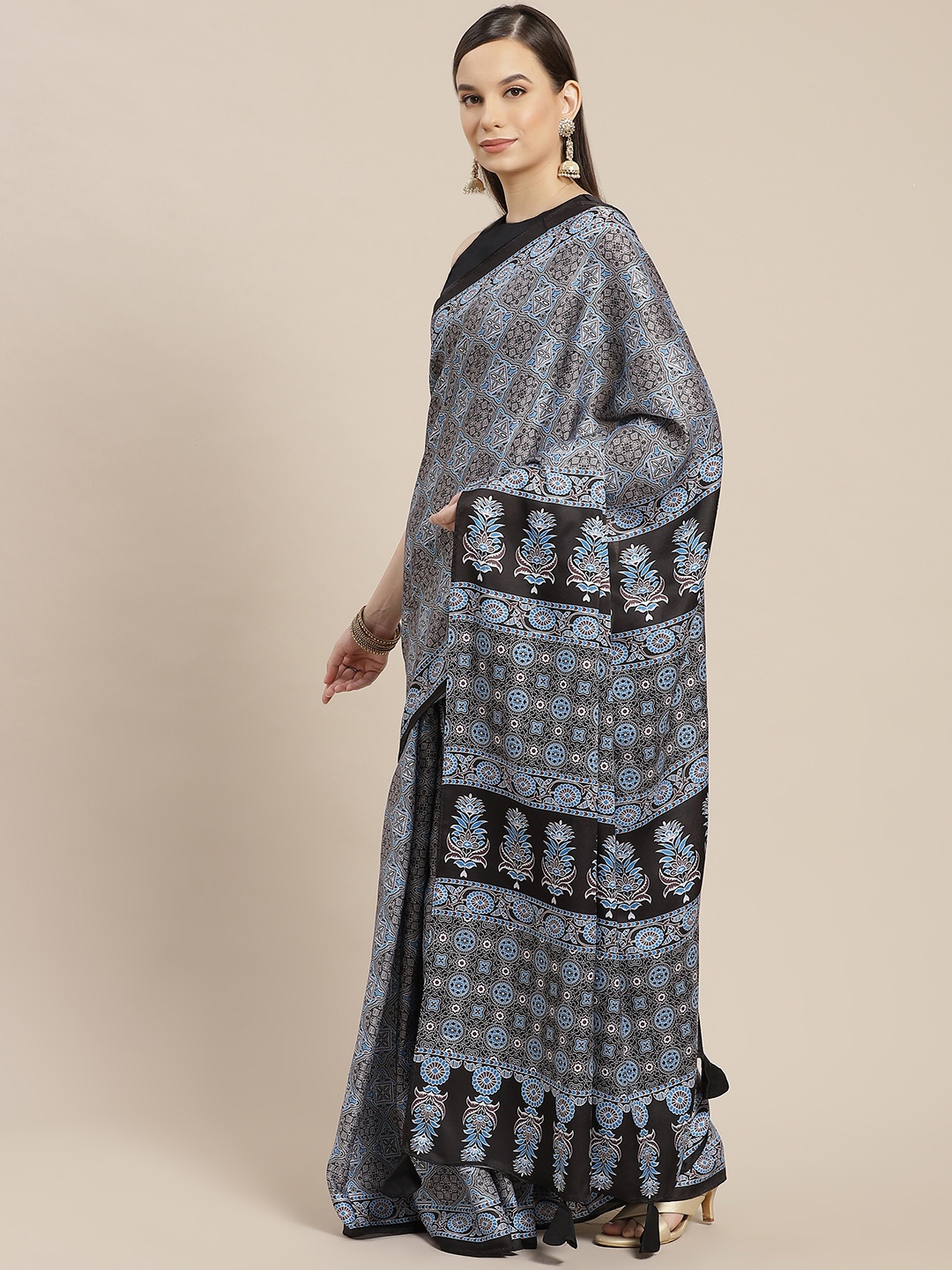 

Inddus Black & Blue Ethnic Motifs Saree