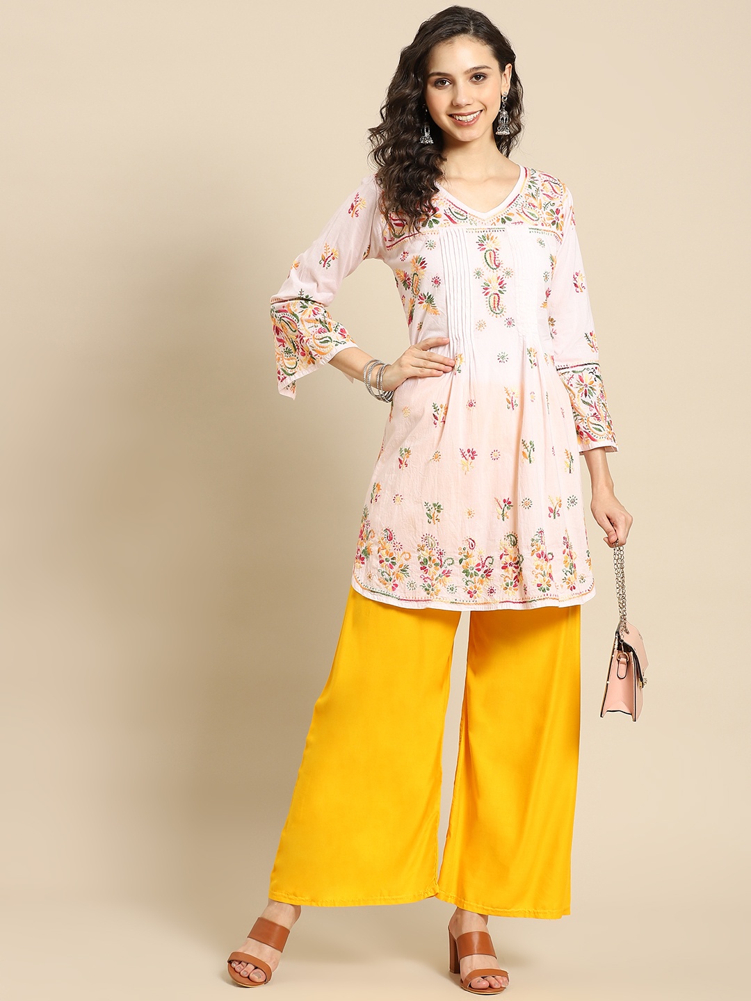 

Saadgi Women Pink & Yellow Ethnic Motifs Embroidered Chikankari Cotton Kurta with Palazzos