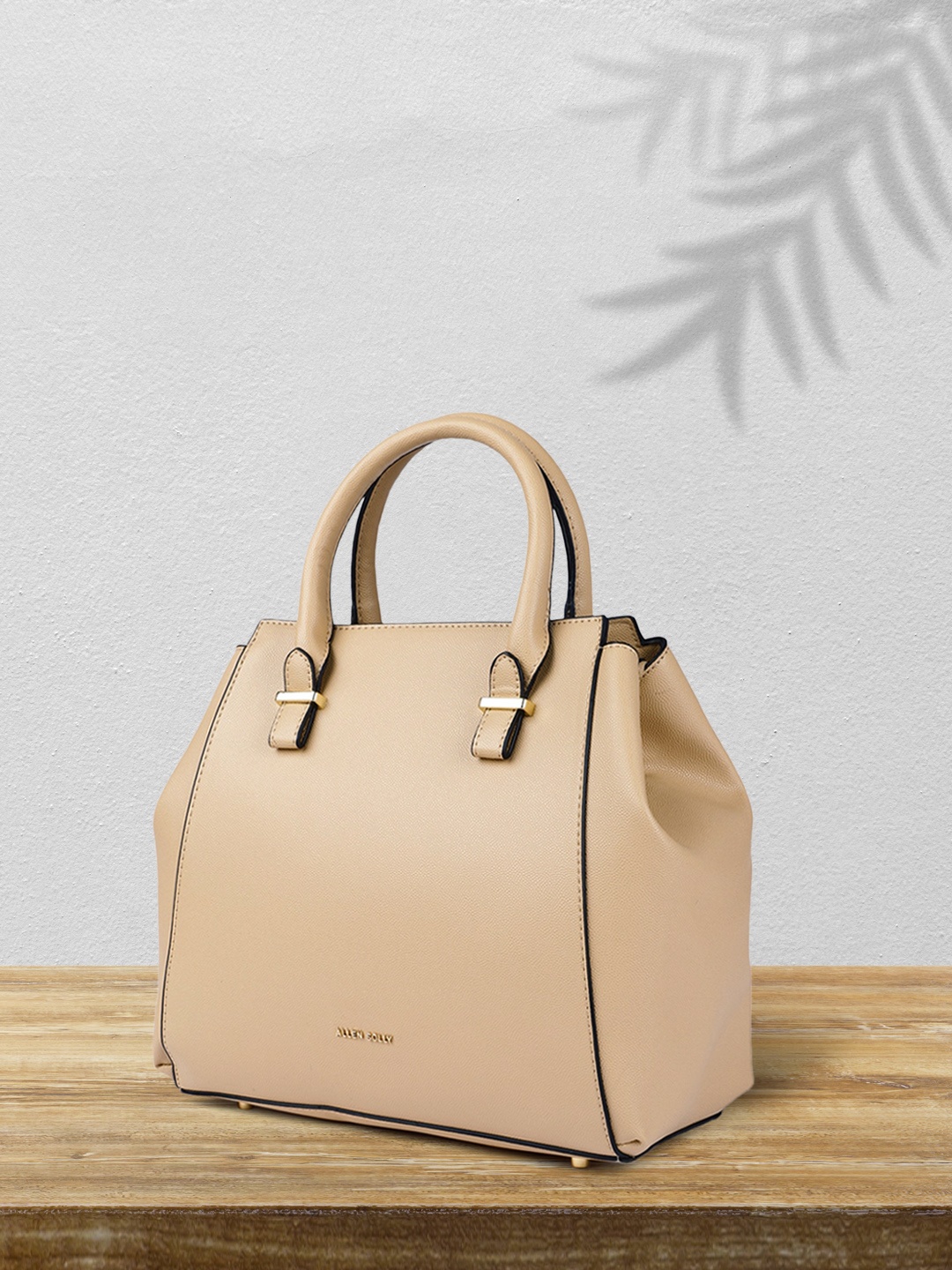 

Allen Solly Beige Solid Bowling Handheld Bag