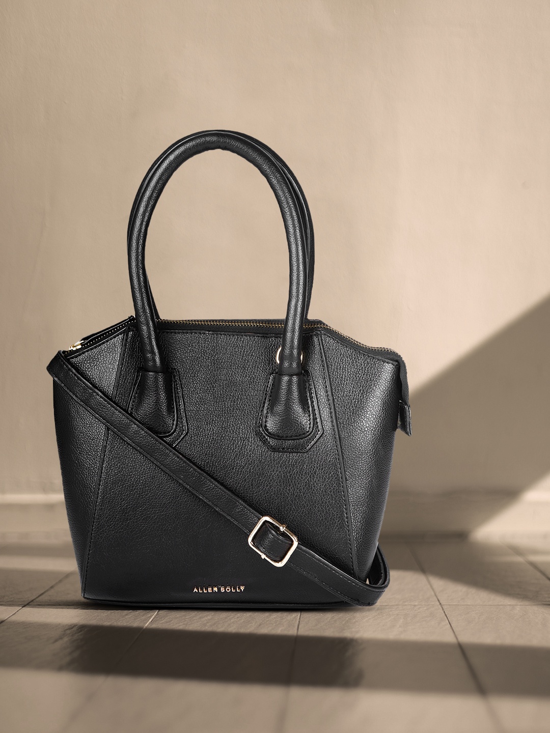 

Allen Solly Black Solid PU Regular Structured Handheld Bag
