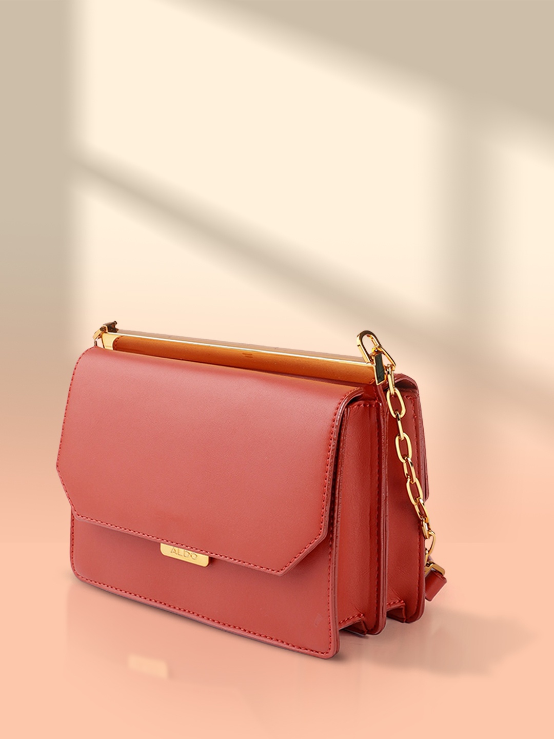 

ALDO Rust Orange Structured Sling Bag
