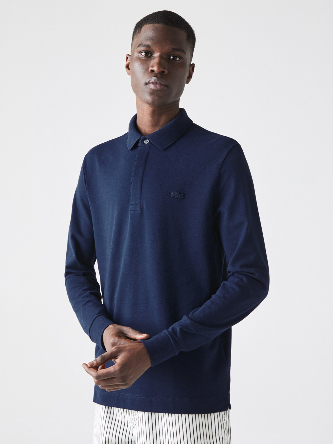 

Lacoste Men Navy Blue Solid Polo Collar T-shirt