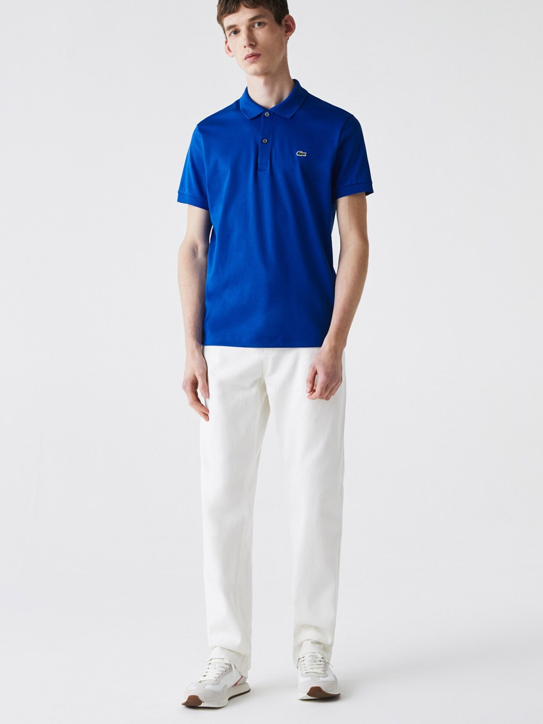 

Lacoste Men Navy Blue Pure Cotton Solid Polo Collar T-shirt