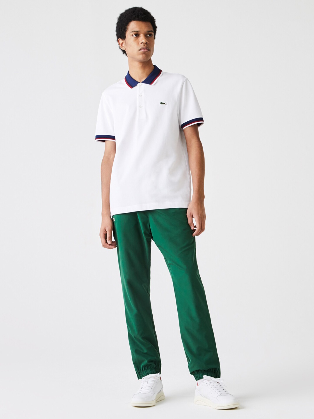 

Lacoste Men White Solid Polo Collar T-shirt