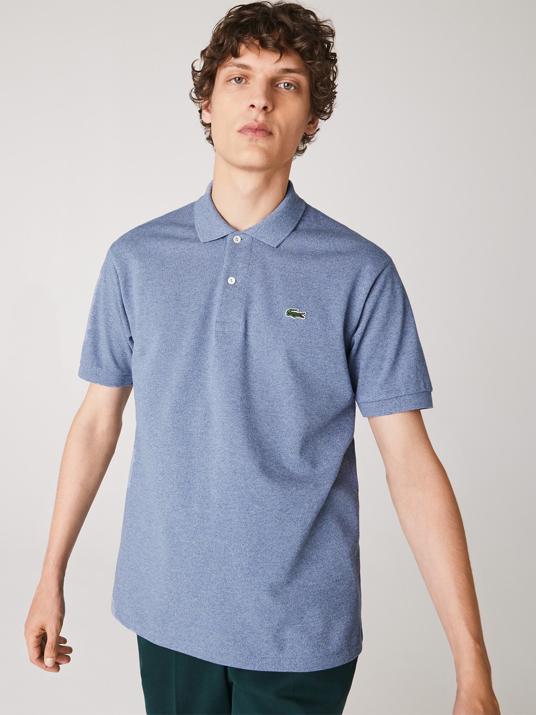 

Lacoste Men Blue Pure Cotton Solid Polo Collar T-shirt