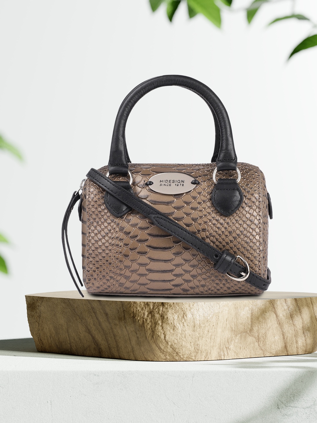 

Hidesign Gunmetal-Toned Snake Skin Textured Leather Bowling Handheld Bag, Metallic