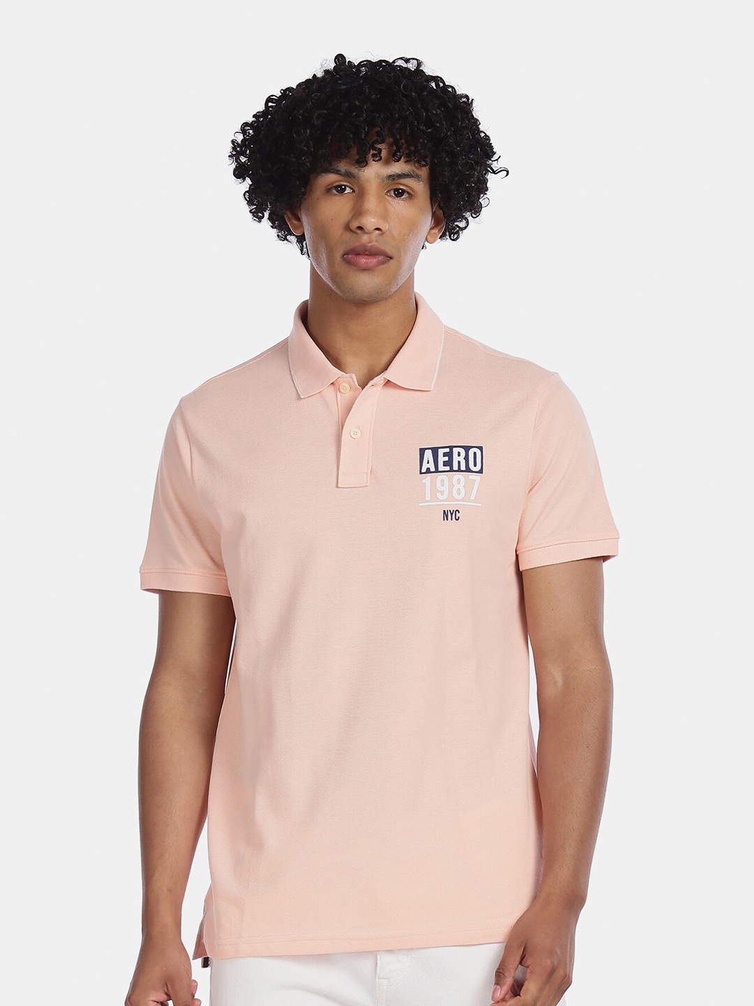 

Aeropostale Men Pink Solid Polo Collar T-shirt