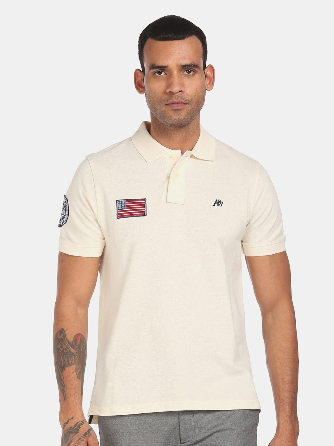 

Aeropostale Men Off-White Solid Polo Neck T-shirt